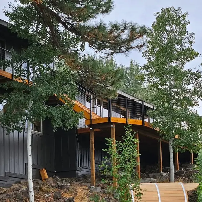 Raised deck along wooded home