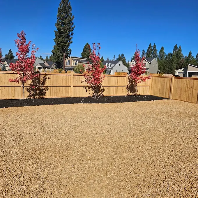 Fencing across a broad yard