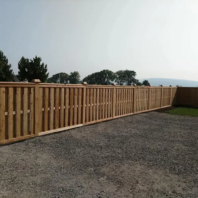 Picket fence across yard