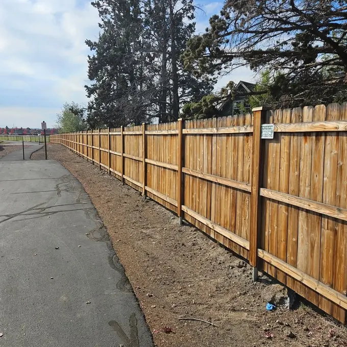 Sidewalk-side fence run